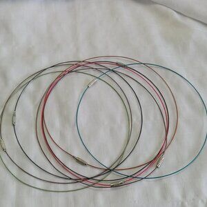 Over 150 stainless steel necklaces with colored plastic sheathing and more